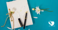 How To Journal Featured Image - a journal and two pens