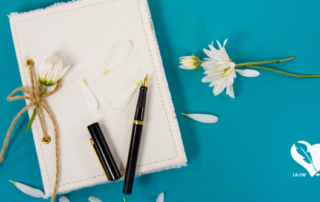 How To Journal Featured Image - a journal and two pens